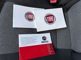 a red and black seat belt with a fiat logo on it