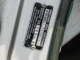 a close up of a motorcycle tire with a sticker on it
