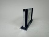 a picture of a clock on a stand on a table