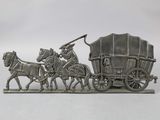 une figurine en argent représentant une calèche