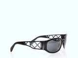 black and white sunglasses on a white background with reflection