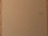 a picture of a piece of cardboard taped to a piece of wood