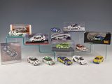 a lot of toy cars on display in a display case