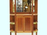 an image of a wooden display cabinet with a glass door