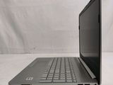 an open laptop computer sitting on top of a white surface