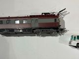 a toy bus and a toy bus on a wall
