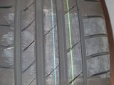an image of a close up of a tire on a table
