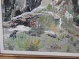 a picture of a painting of a mountain scene in a frame