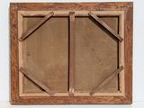 an old picture frame with a wooden frame and a brown background