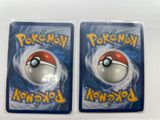two packs of pokemon cards with a poke poke poke poke poke poke poke poke poke poke poke poke poke poke poke poke poke poke poke poke poke poke poke poke poke