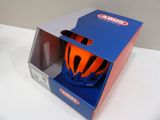 a helmet inside of a box on a table