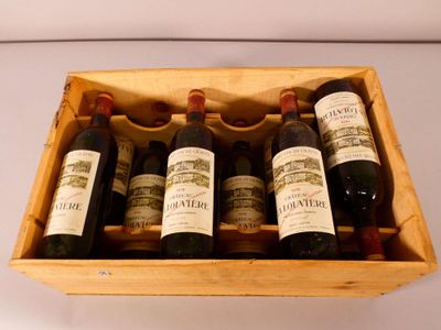 six bottles of wine in a wooden box