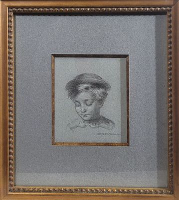 portrait of a young boy in a straw hat by person