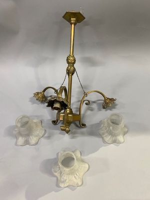 brass plated chandelier with five glass flowers and a candle holder