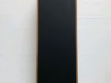 an image of a black speaker on a white surface