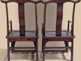 pair of antique chinese chairs with black leather seat cushions