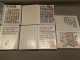 a lot of stamps in a folder on the table