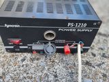a close up of a power supply sitting on a concrete surface