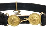 an image of a belt with two gold medallions on it