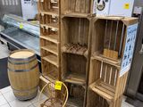 a wooden shelf in the middle of a kitchen