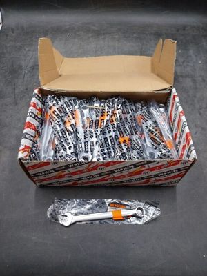 a box of candy and a pair of scissors on a table