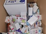 a box full of toilet paper and other items in it