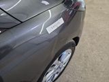 a close up of a car with a sticker on it ' s hood