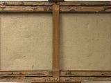 an old picture frame with a piece of wood sticking out of it
