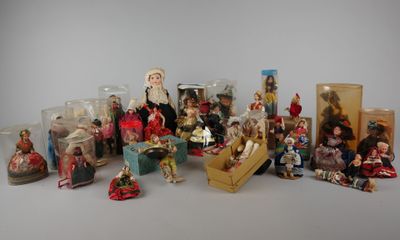many figurines that are sitting on a table