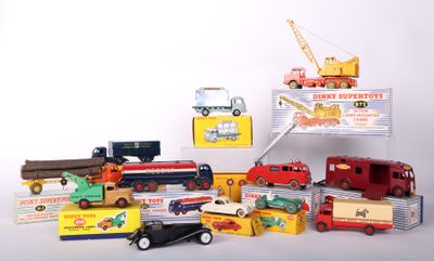 many different types of toy trucks and trucks on the table