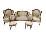 une image représentant un ensemble composé de quatre chaises et d'un canapé