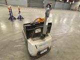a robot that is sitting in the middle of a building