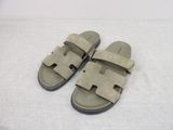 men ' s sandal with two straps on each side of the foot