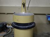 a yellow and black machine sitting on top of a table