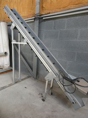 an image of a conveyor belt in a building