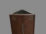 a wooden box with a metal handle on a gray background