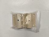 two pieces of metal on a white surface