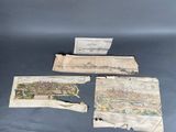trois anciennes cartes d'une ville sur fond bleu