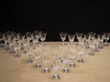 a lot of empty wine glasses sitting on a table