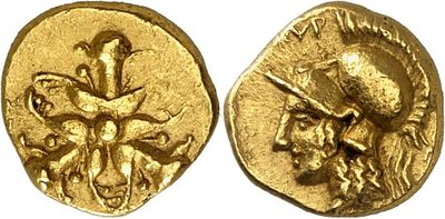 a gold coin with an image of a man on it