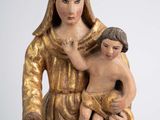 an image of a statue of a woman holding a child