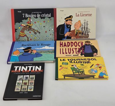 quatre livres pour enfants sont alignés sur une surface blanche