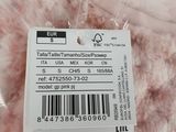 a label on the back of a shirt that is wrapped in plastic