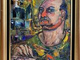 a painting of a man with a mustache in a gold frame