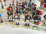 many figurines of different types of soldiers on display