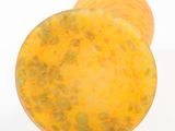 a close up view of a pair of oranges on a white background