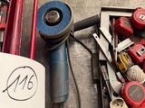 a box full of tools that are sitting on the floor