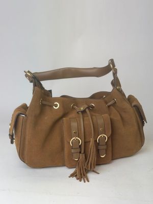 brown sued handbag with tassels and gold hardware