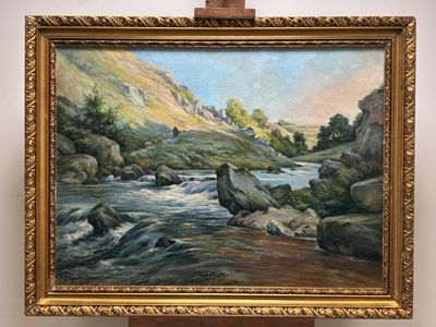 a painting on a easel with a painting of a river in the background