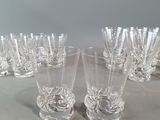 a lot of glasses sitting on a table together